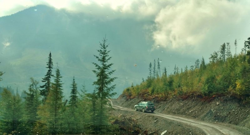 Blaeberry Forest Service Road in the rugged mountains. Mud can make the road slippery and treacherous with the dropoffs. Best to have 4 wheel drive or hike it.