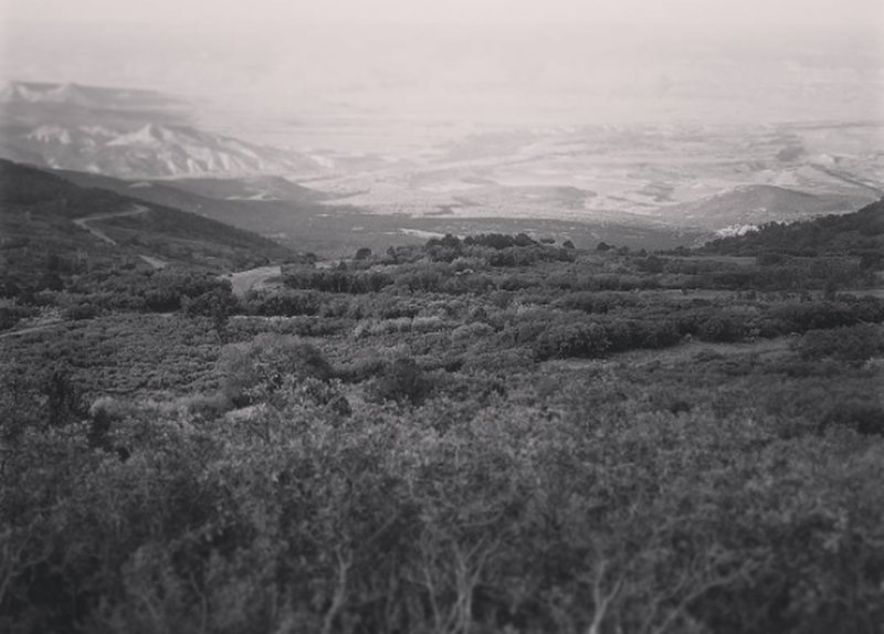 A view of Western Colorado as it expands beneath the feet of the Grand Mesa--the tallest flat topped mountain in the world.