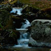 One of the many cascading falls as you descend Rose River Loop