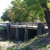 Iconic CCC bridge featured in park souvenirs such as path tags and shirts.