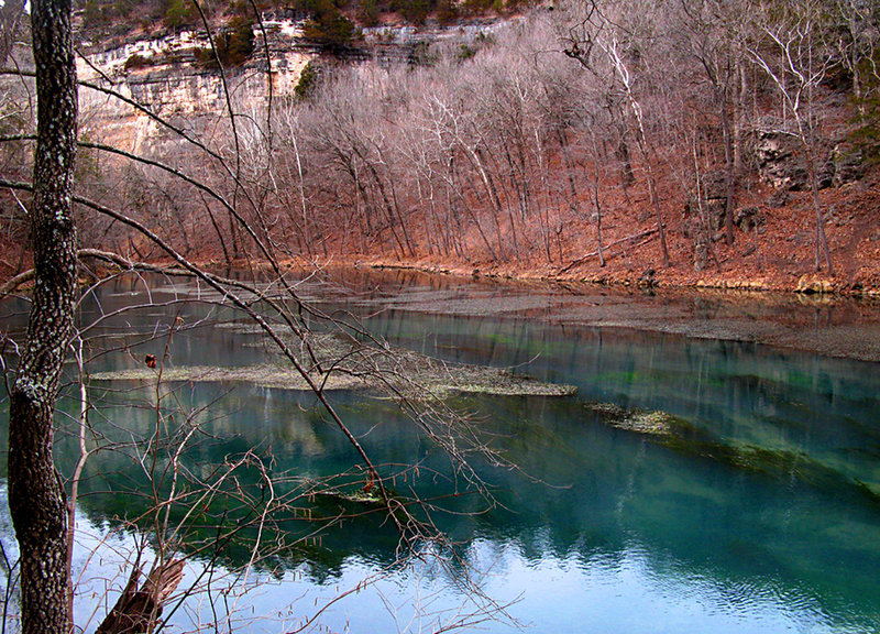 On the Ha Ha Tonka Spring Trail, winter time, looking northwest, across the spring pool at cliffs below the "castle." About:  37.973956, -92.768286