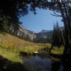 In the meadow looking up towards the scramble and the lake