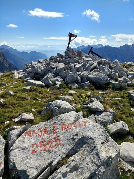 The markers at the summit of Maja e Rosit