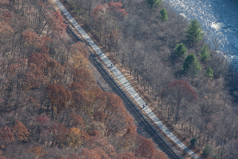 Bikers on the trail, rail tracks and Lehigh River