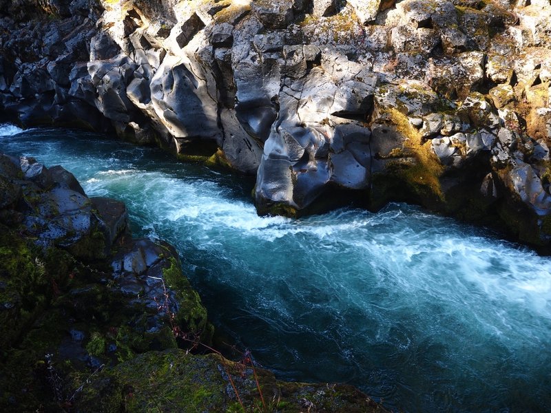 The river has polished the incredibly hard basalt to a smooth finish