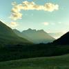 The sun sets behind the mountains to the west, as seen from the prairie along Horseshoe Basin Trail.