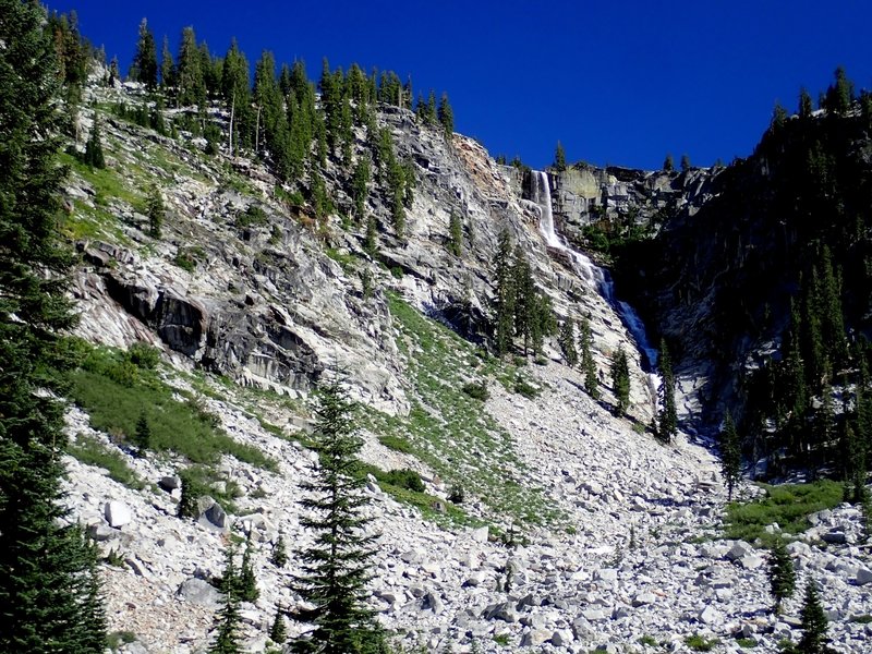 The scramble trail to Grizzly Lake climbs the broken slopes to the left.