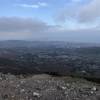 Hazy view of Dublin from peak