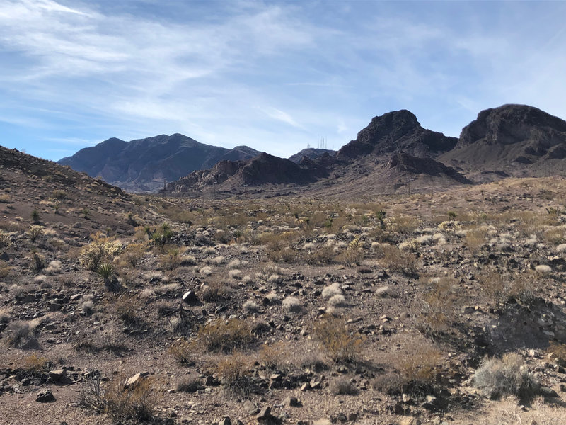 Closer view of backside of Black Mountain and remains of volcanic rock. Near 701 trail shortcut.