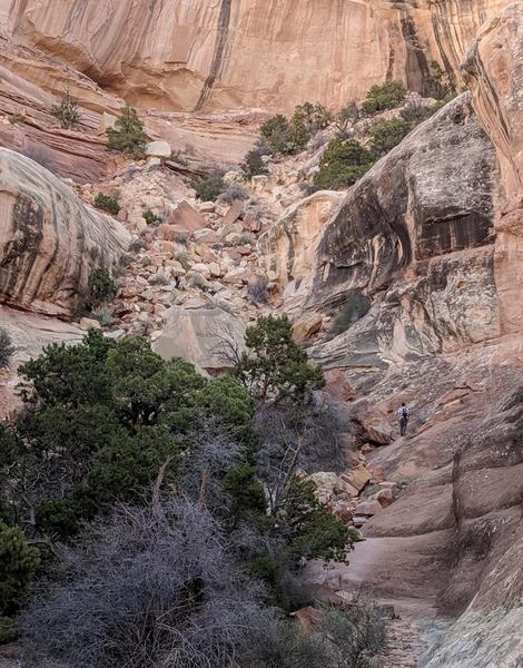 The final ascent to Druid Arch. Note the hikers going up the talus slope. Just keep going up until the arch appears to your right.