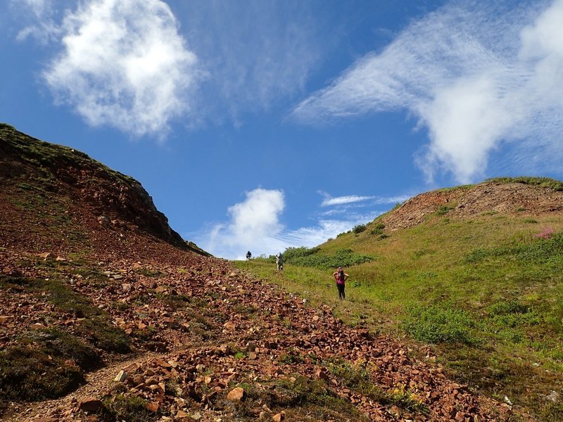 Climbing up through the notch to the alpine plateau