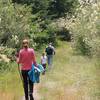 Family in the meadow portion of Guemes Mountain Trail.