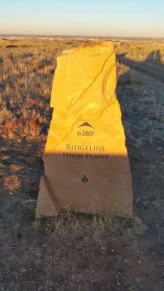 This stone marks the highest point on the ridgeline traversed by the East/West Regional Trail.