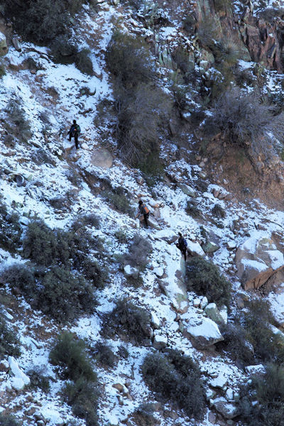 Hikers in the Siphon Draw ice chute.