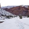 The steep anticline can get tricky if snowfalls. Hiking poles would help, regardless of season