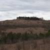 The trail starts to open up as it climbs up the hillside. Views of the surrounding hills open up before you.