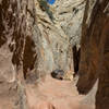 Kayenta and Navajo Sandstone with some volcanic boulders.