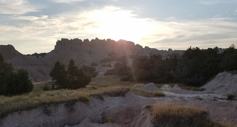 Sun setting over tent at deer haven