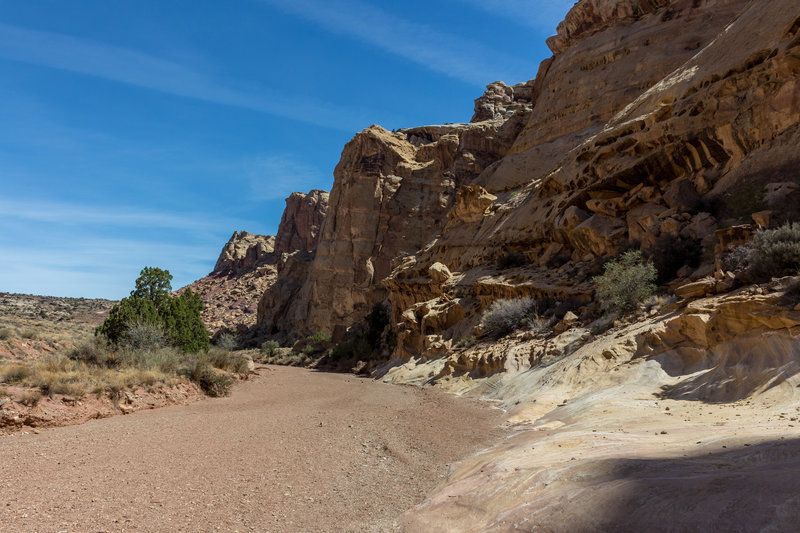 As you exit the San Rafael Reef, Bell Canyon hugs the sandstone domes