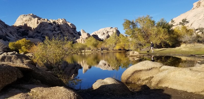 Eastside or backside of Baker Dam facing N. Nice reflections in the water. Lots of people taking photos of each other.