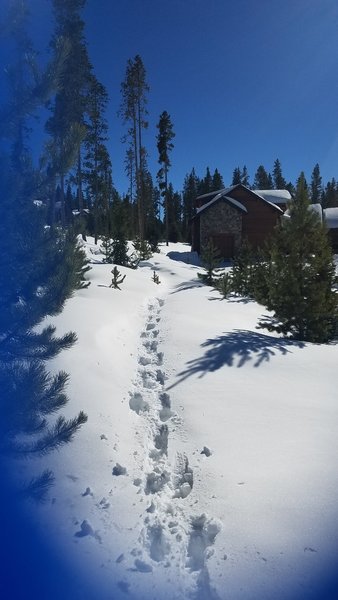 As of 2/1, headed North to South, at Barney Ford Trail off the road.