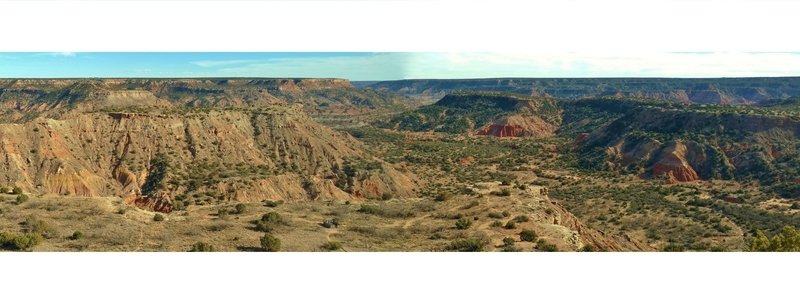 Palo Duro Canyon from the canyon rim viewpoint. 90 degree panorama. Left/east to right/south - ridge to Goodnight Peak with Prairie Dog Fork Red River behind it, Timber Creek in the foreground, and Timber Mesa on the far side of Timber Creek.