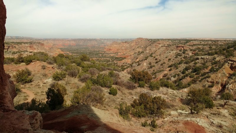 Left to right - Table Mesa, Sunday Creek Valley with Timber Mesa in the distance where the valley bends right, and Capitol Mesa, looking north from the ledge up on the Lighthouse (foreground, very left).