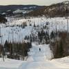 Skier on Upper Deck approaching McLean Lake Trail.