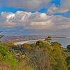 Half Moon Bay in evening sunlight from top of Almeria Trail.