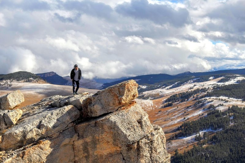 From the summit of Steamboat rock looking south towards a cloud covered cloud peak wilderness.