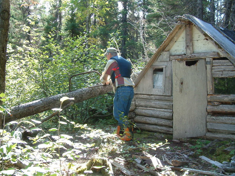 Sam repairing an old tilt by Tilt Pond on the back country trail beginning at Colin's Hut