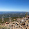 Far reaching views from the rocky top of Sierra Buttes