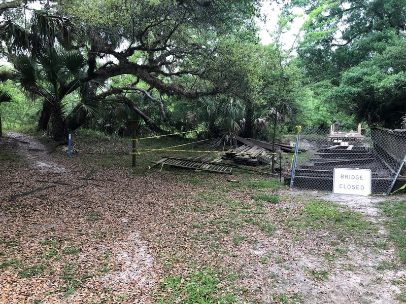 Foot bridge that crosses the river and leads to equestrian area and more trails in under repair.