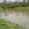 Small Pond with trail around the perimeter.