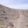 Singletrack winding around the east side of "Vulcan" volcano