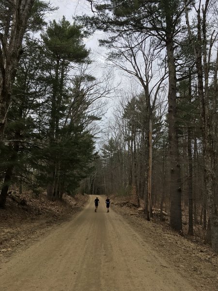 Running along Reservation Road. There may be cars passing time to time to access trailheads.