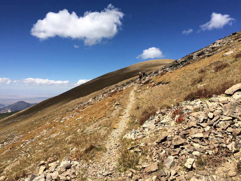 On the way to the summit looking west.