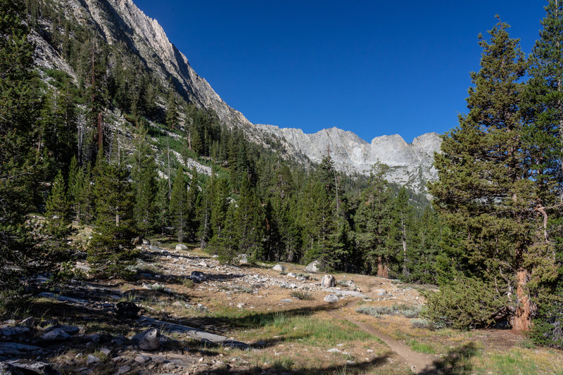 Early morning on the ascend to Rae Lakes with Mount Clarence King towering high above.