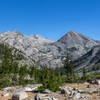 Looking back down the valley on the John Muir Trail with Pyramid Peak, Window Peak, and Castle Domes in the far.