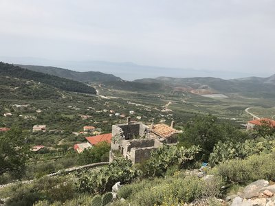 Beautiful abandoned stone home on the trail toward the Cave of Kreshmoi