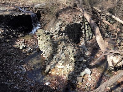 a stream and stone wall, seen from the horse-shoe trail