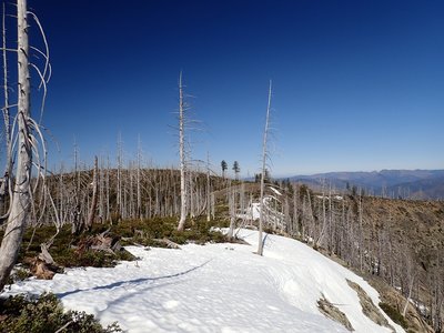 Snow lingers on the rim