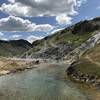 An excellent hot spring that gushes out of the side of the canyon wall.