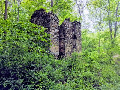 old two story house right off the trail
