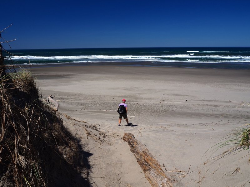 Crossing on to the ocean beach just west of the parking area.