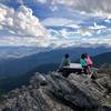 Picnic table behind the lookout tower. Mt. Evans on the horizon.