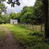 Coming out of the woods at the Gilmore Farm -- cabin built by a former slave of James Madison in the 1870s. Restored to its 1875 appearance.