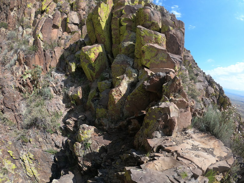 It is a Class II scramble up these rocks after the gully.