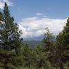 The view of Pikes Peak area from the Sawmill Trail at the junction with the Hans Loop Trail.
