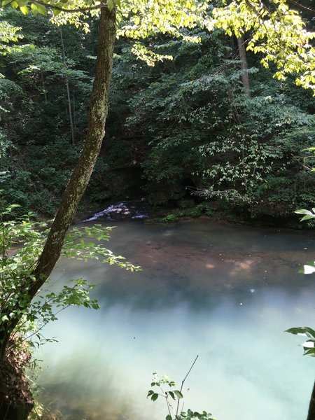 View of Hamer Cave and the pool of cave water